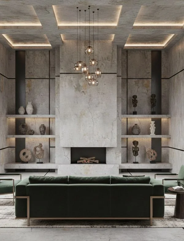 Luxury modern living room featuring a floor-to-ceiling stone fireplace, built-in stone shelving with curated artifacts, a cluster of smoked glass globe pendants, and a deep green velvet sofa.
